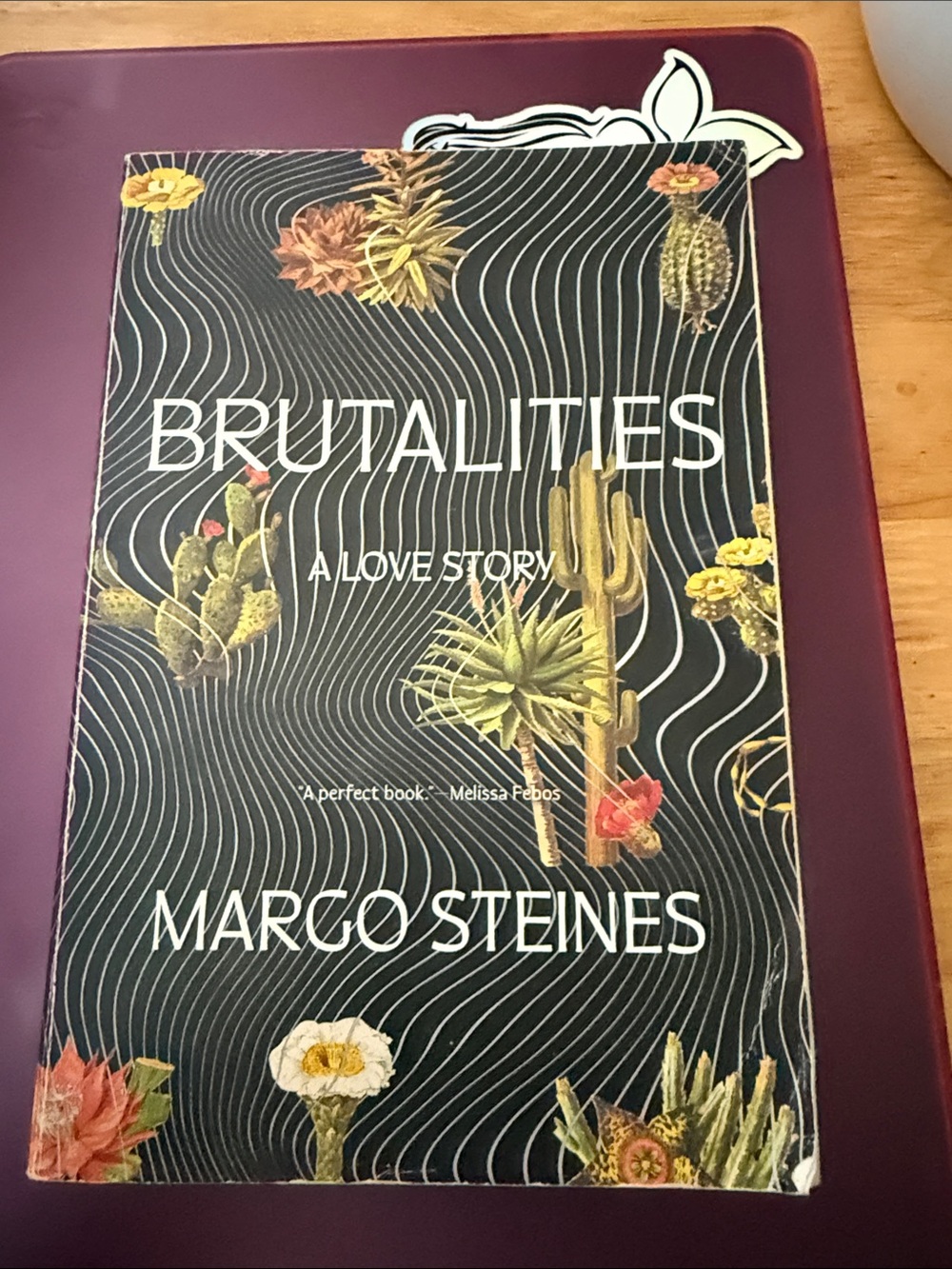 Brutalities: A Love Story by Margot Steines - Black Floral Cover - signed